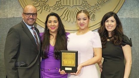 Chevron employees Alejandro Arbelaez, Liliana Cevallos, Matty Restivo and Vanessa Teran accept the 2023 Latino Equity 100 award, which recognizes companies providing the most opportunities for Latinos.