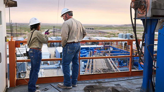 Two Chevron workers having a discussion