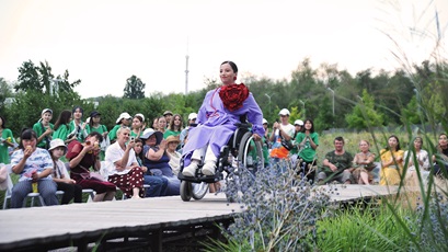 A woman models ecofriendly clothing during a recent event in Kazakhstan.